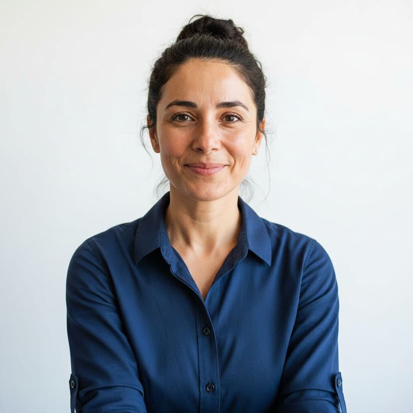 Professional business owner headshot of a woman in a smart shirt